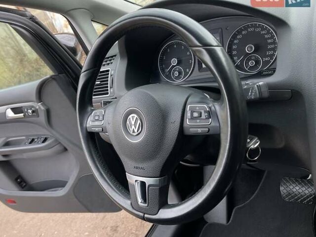 Черный Фольксваген Туран, объемом двигателя 1.4 л и пробегом 207 тыс. км за 10777 $, фото 65 на Automoto.ua