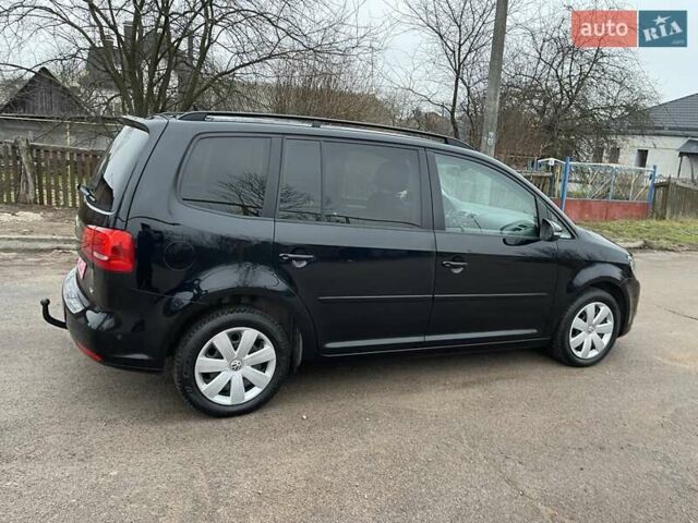 Черный Фольксваген Туран, объемом двигателя 1.4 л и пробегом 207 тыс. км за 10777 $, фото 189 на Automoto.ua