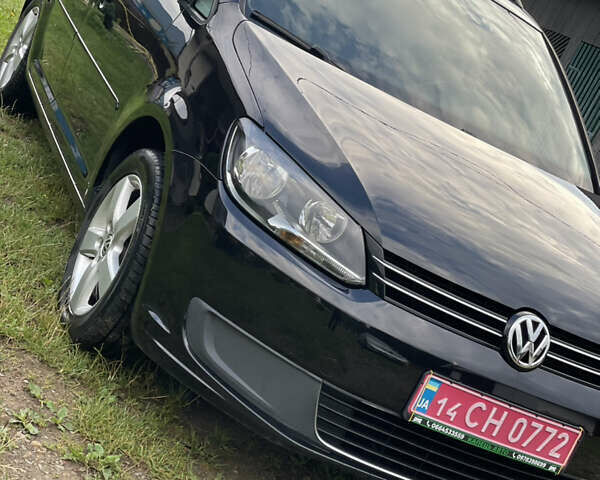 Чорний Фольксваген Туран, об'ємом двигуна 1.6 л та пробігом 253 тис. км за 12700 $, фото 1 на Automoto.ua