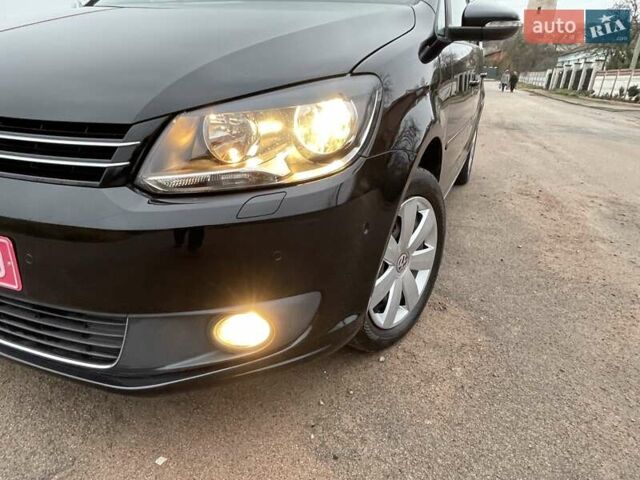 Черный Фольксваген Туран, объемом двигателя 1.4 л и пробегом 207 тыс. км за 10777 $, фото 104 на Automoto.ua