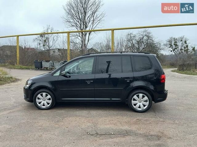 Черный Фольксваген Туран, объемом двигателя 1.4 л и пробегом 207 тыс. км за 10777 $, фото 109 на Automoto.ua