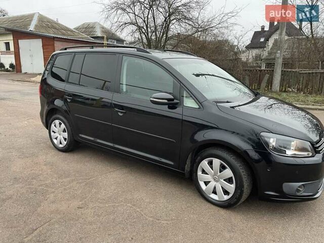 Черный Фольксваген Туран, объемом двигателя 1.4 л и пробегом 207 тыс. км за 10777 $, фото 167 на Automoto.ua