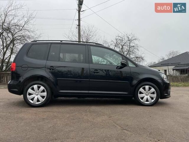 Черный Фольксваген Туран, объемом двигателя 1.4 л и пробегом 207 тыс. км за 10777 $, фото 120 на Automoto.ua