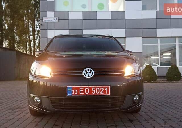 Черный Фольксваген Туран, объемом двигателя 1.6 л и пробегом 165 тыс. км за 13250 $, фото 1 на Automoto.ua