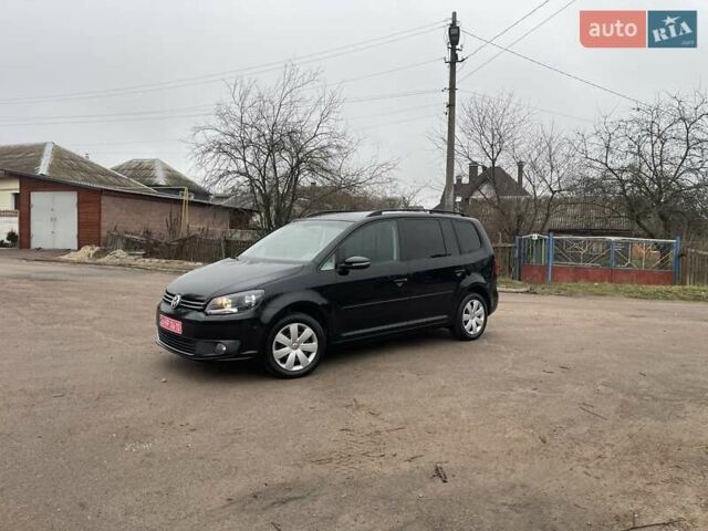 Черный Фольксваген Туран, объемом двигателя 1.4 л и пробегом 207 тыс. км за 10777 $, фото 8 на Automoto.ua