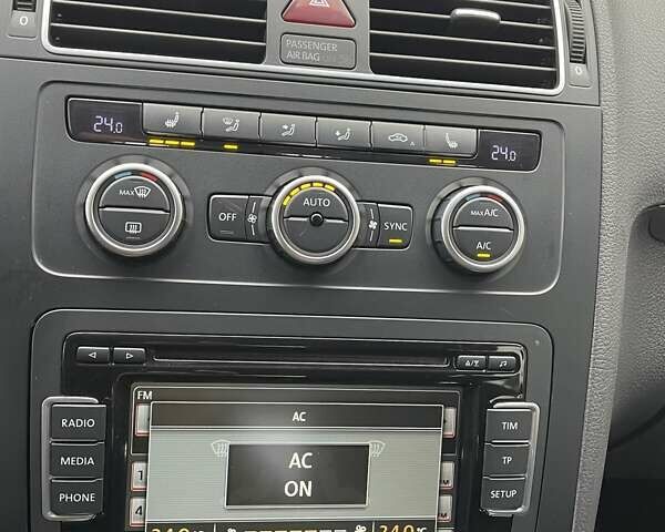 Черный Фольксваген Туран, объемом двигателя 1.4 л и пробегом 207 тыс. км за 10777 $, фото 68 на Automoto.ua