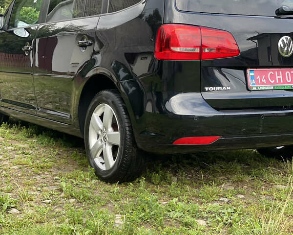 Чорний Фольксваген Туран, об'ємом двигуна 1.6 л та пробігом 253 тис. км за 12700 $, фото 7 на Automoto.ua