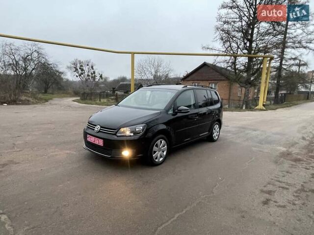 Черный Фольксваген Туран, объемом двигателя 1.4 л и пробегом 207 тыс. км за 10777 $, фото 191 на Automoto.ua