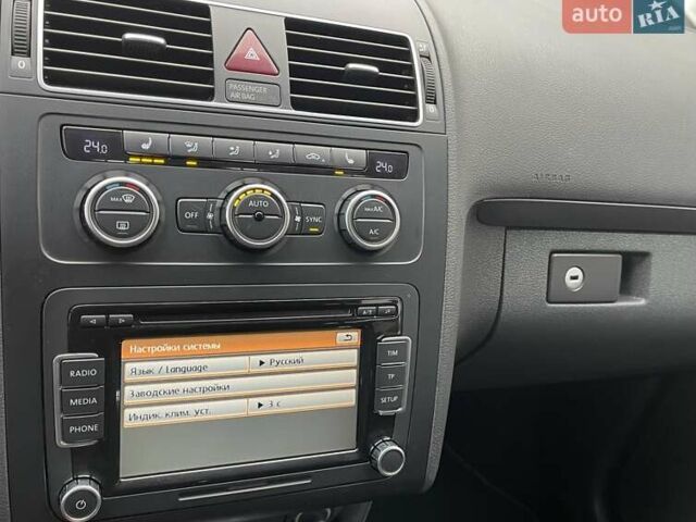 Черный Фольксваген Туран, объемом двигателя 1.4 л и пробегом 207 тыс. км за 10777 $, фото 71 на Automoto.ua