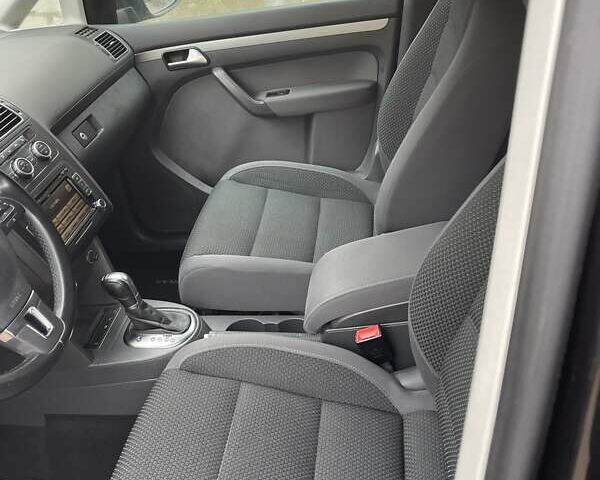 Черный Фольксваген Туран, объемом двигателя 1.4 л и пробегом 207 тыс. км за 10777 $, фото 58 на Automoto.ua