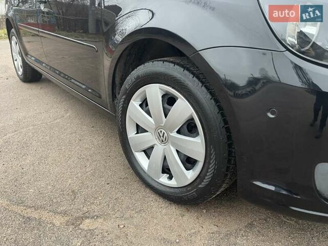 Черный Фольксваген Туран, объемом двигателя 1.4 л и пробегом 207 тыс. км за 10777 $, фото 90 на Automoto.ua