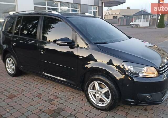 Черный Фольксваген Туран, объемом двигателя 1.6 л и пробегом 165 тыс. км за 13250 $, фото 2 на Automoto.ua