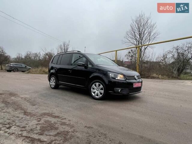 Черный Фольксваген Туран, объемом двигателя 1.4 л и пробегом 207 тыс. км за 10777 $, фото 179 на Automoto.ua