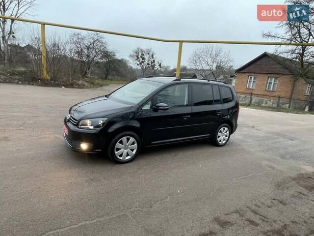 Черный Фольксваген Туран, объемом двигателя 1.4 л и пробегом 207 тыс. км за 10777 $, фото 192 на Automoto.ua