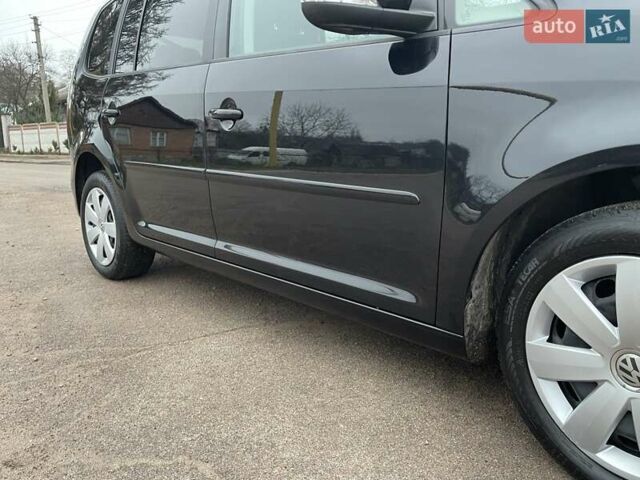 Черный Фольксваген Туран, объемом двигателя 1.4 л и пробегом 207 тыс. км за 10777 $, фото 121 на Automoto.ua