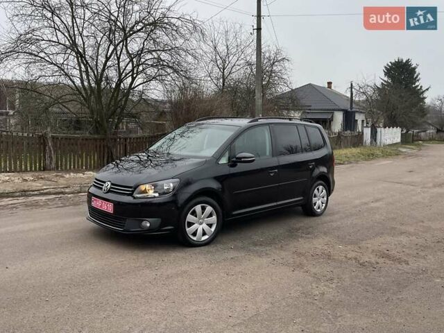 Черный Фольксваген Туран, объемом двигателя 1.4 л и пробегом 207 тыс. км за 10777 $, фото 171 на Automoto.ua