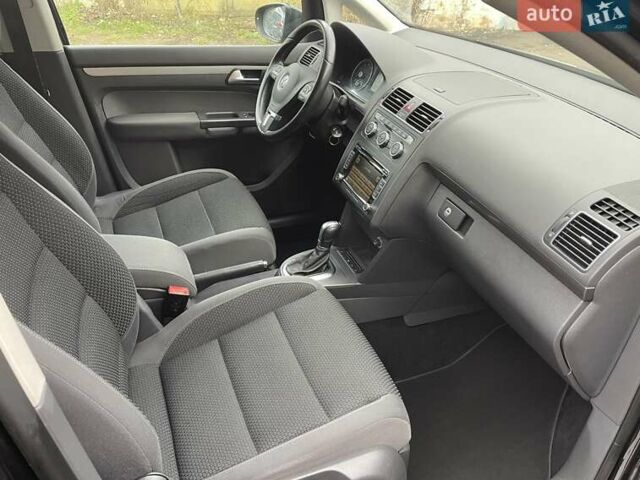 Черный Фольксваген Туран, объемом двигателя 1.4 л и пробегом 207 тыс. км за 10777 $, фото 214 на Automoto.ua