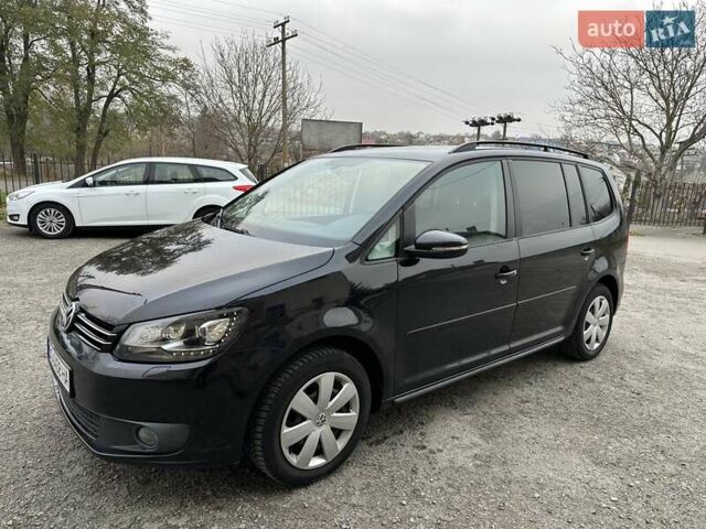 Чорний Фольксваген Туран, об'ємом двигуна 2 л та пробігом 248 тис. км за 13150 $, фото 1 на Automoto.ua