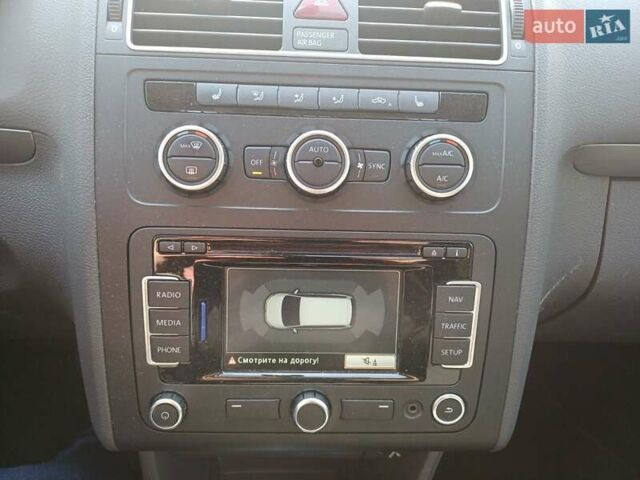 Черный Фольксваген Туран, объемом двигателя 1.97 л и пробегом 128 тыс. км за 15800 $, фото 12 на Automoto.ua