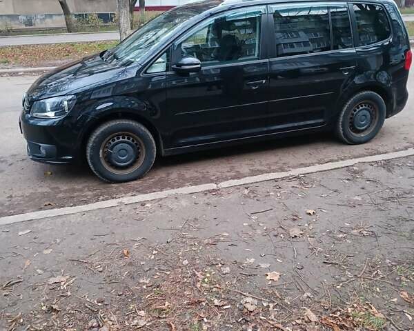 Черный Фольксваген Туран, объемом двигателя 1.6 л и пробегом 293 тыс. км за 10500 $, фото 4 на Automoto.ua