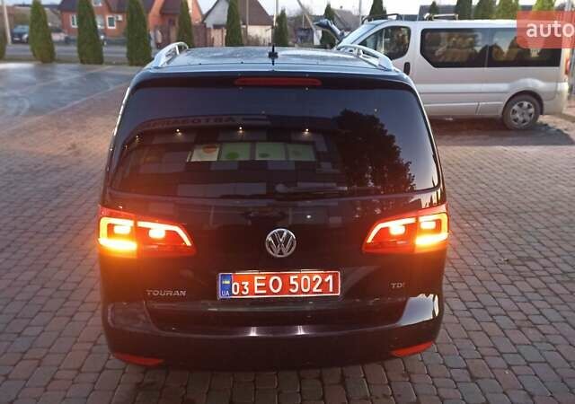 Черный Фольксваген Туран, объемом двигателя 1.6 л и пробегом 165 тыс. км за 13250 $, фото 76 на Automoto.ua