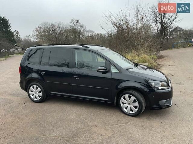 Черный Фольксваген Туран, объемом двигателя 1.4 л и пробегом 207 тыс. км за 10777 $, фото 93 на Automoto.ua