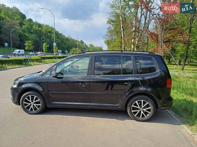 Черный Фольксваген Туран, объемом двигателя 1.97 л и пробегом 128 тыс. км за 15800 $, фото 2 на Automoto.ua