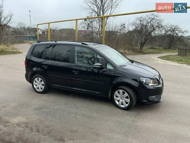 Черный Фольксваген Туран, объемом двигателя 1.4 л и пробегом 207 тыс. км за 10777 $, фото 183 на Automoto.ua