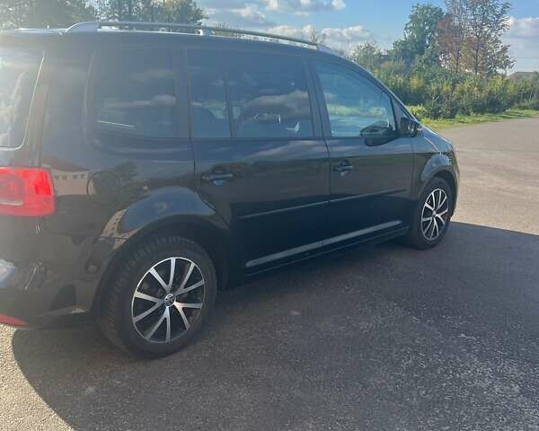 Черный Фольксваген Туран, объемом двигателя 1.6 л и пробегом 295 тыс. км за 12100 $, фото 3 на Automoto.ua