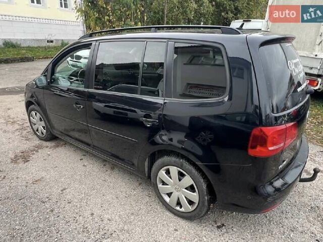 Черный Фольксваген Туран, объемом двигателя 1.4 л и пробегом 207 тыс. км за 10777 $, фото 224 на Automoto.ua