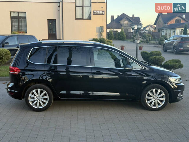Чорний Фольксваген Туран, об'ємом двигуна 2 л та пробігом 239 тис. км за 16250 $, фото 19 на Automoto.ua