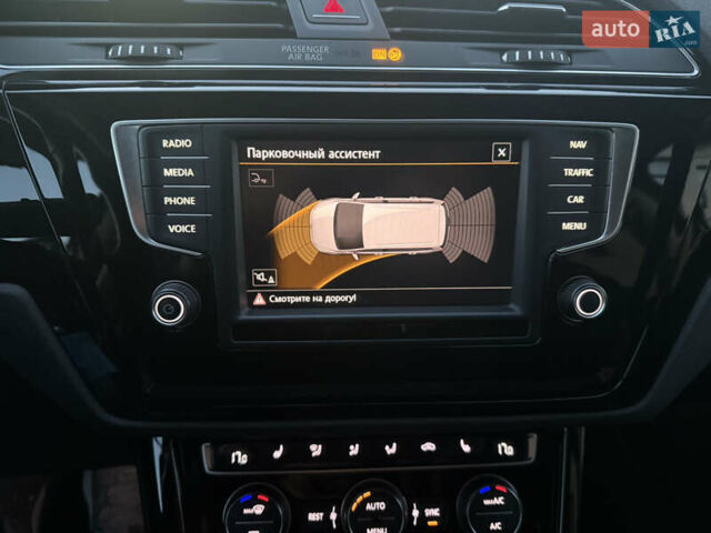 Чорний Фольксваген Туран, об'ємом двигуна 2 л та пробігом 239 тис. км за 16250 $, фото 39 на Automoto.ua