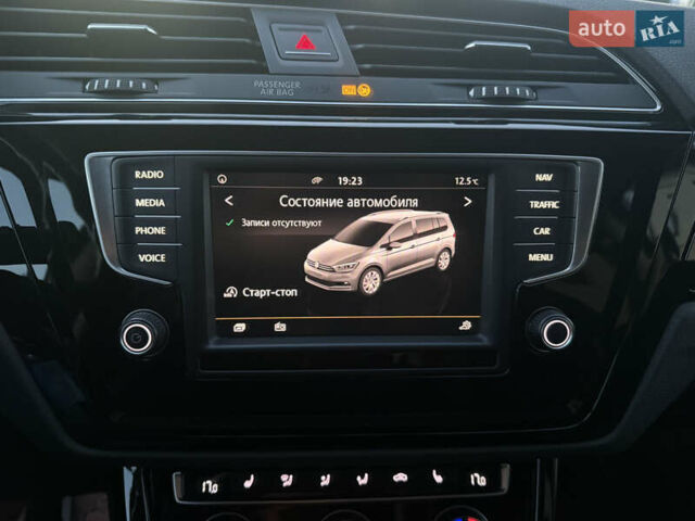 Чорний Фольксваген Туран, об'ємом двигуна 2 л та пробігом 239 тис. км за 16250 $, фото 40 на Automoto.ua