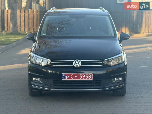 Чорний Фольксваген Туран, об'ємом двигуна 2 л та пробігом 239 тис. км за 16250 $, фото 1 на Automoto.ua