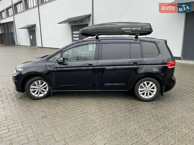 Черный Фольксваген Туран, объемом двигателя 1.97 л и пробегом 242 тыс. км за 14200 $, фото 3 на Automoto.ua