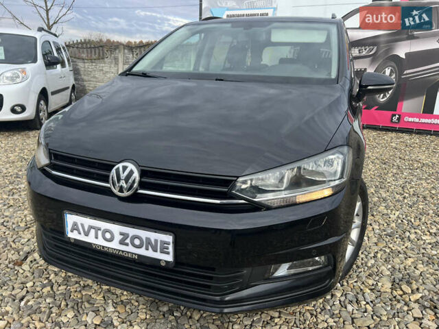 Черный Фольксваген Туран, объемом двигателя 1.6 л и пробегом 197 тыс. км за 14599 $, фото 1 на Automoto.ua