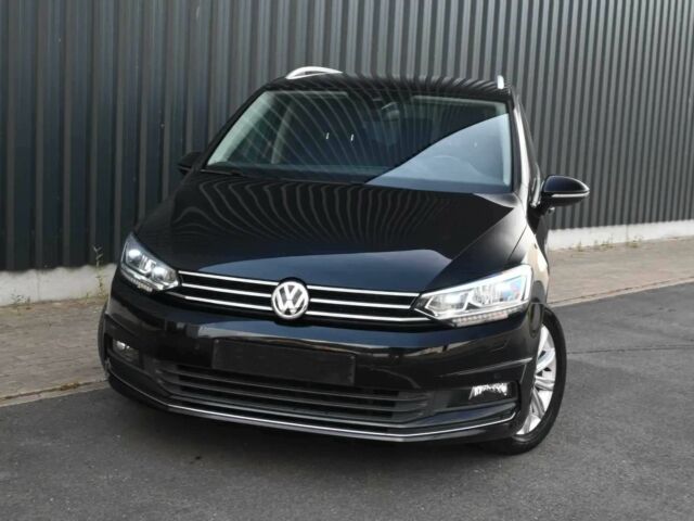 Черный Фольксваген Туран, объемом двигателя 1.8 л и пробегом 53 тыс. км за 16000 $, фото 1 на Automoto.ua