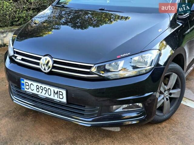 Чорний Фольксваген Туран, об'ємом двигуна 1.97 л та пробігом 240 тис. км за 14700 $, фото 1 на Automoto.ua