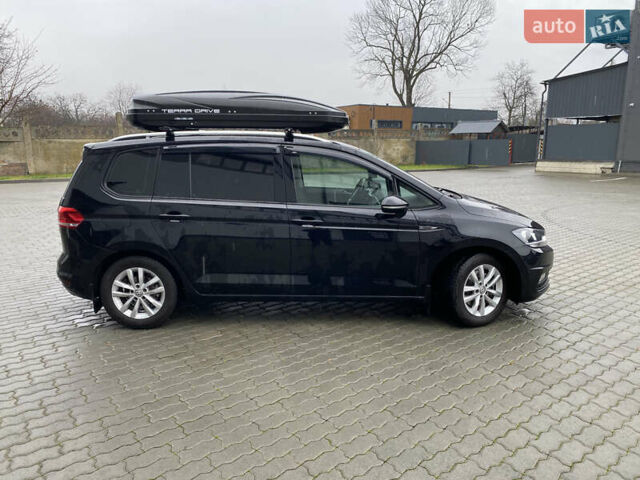 Черный Фольксваген Туран, объемом двигателя 1.97 л и пробегом 242 тыс. км за 14200 $, фото 4 на Automoto.ua