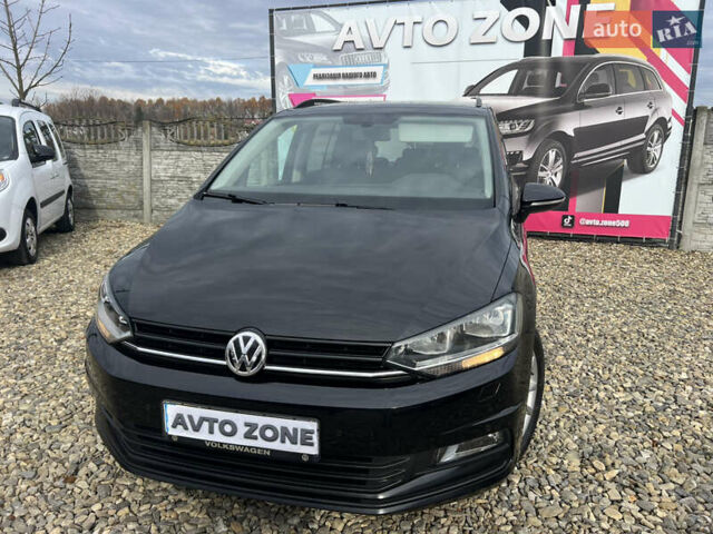 Черный Фольксваген Туран, объемом двигателя 1.6 л и пробегом 197 тыс. км за 14599 $, фото 2 на Automoto.ua