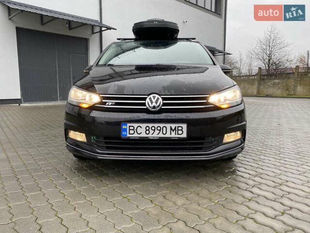 Черный Фольксваген Туран, объемом двигателя 1.97 л и пробегом 242 тыс. км за 14200 $, фото 2 на Automoto.ua