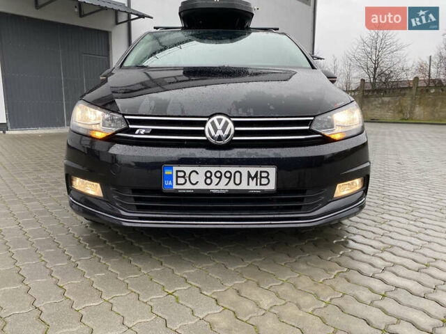 Черный Фольксваген Туран, объемом двигателя 1.97 л и пробегом 242 тыс. км за 14200 $, фото 1 на Automoto.ua
