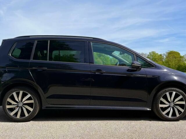 Чорний Фольксваген Туран, об'ємом двигуна 2 л та пробігом 40 тис. км за 8400 $, фото 5 на Automoto.ua