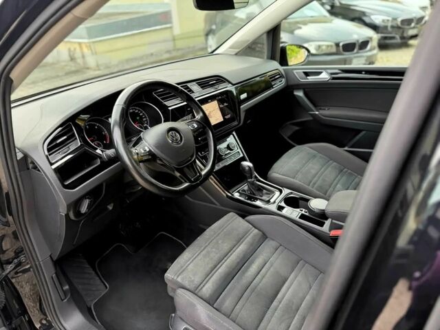 Чорний Фольксваген Туран, об'ємом двигуна 2 л та пробігом 44 тис. км за 12000 $, фото 6 на Automoto.ua