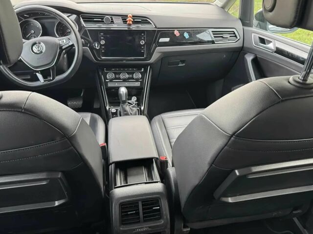 Чорний Фольксваген Туран, об'ємом двигуна 2 л та пробігом 38 тис. км за 12500 $, фото 6 на Automoto.ua