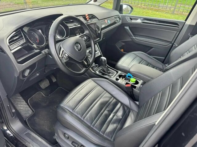 Чорний Фольксваген Туран, об'ємом двигуна 2 л та пробігом 38 тис. км за 12500 $, фото 7 на Automoto.ua