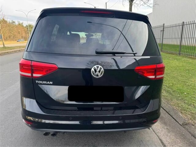 Чорний Фольксваген Туран, об'ємом двигуна 2 л та пробігом 38 тис. км за 12500 $, фото 4 на Automoto.ua