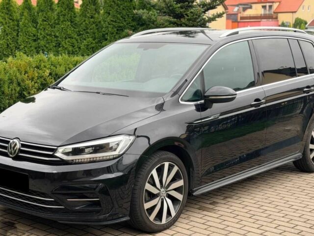 Черный Фольксваген Туран, объемом двигателя 0 л и пробегом 87 тыс. км за 12000 $, фото 1 на Automoto.ua