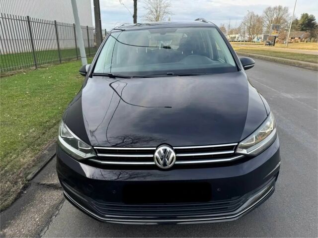 Чорний Фольксваген Туран, об'ємом двигуна 2 л та пробігом 38 тис. км за 12500 $, фото 1 на Automoto.ua