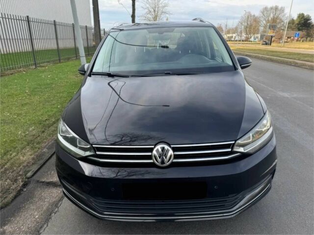 Черный Фольксваген Туран, объемом двигателя 2 л и пробегом 35 тыс. км за 6700 $, фото 1 на Automoto.ua